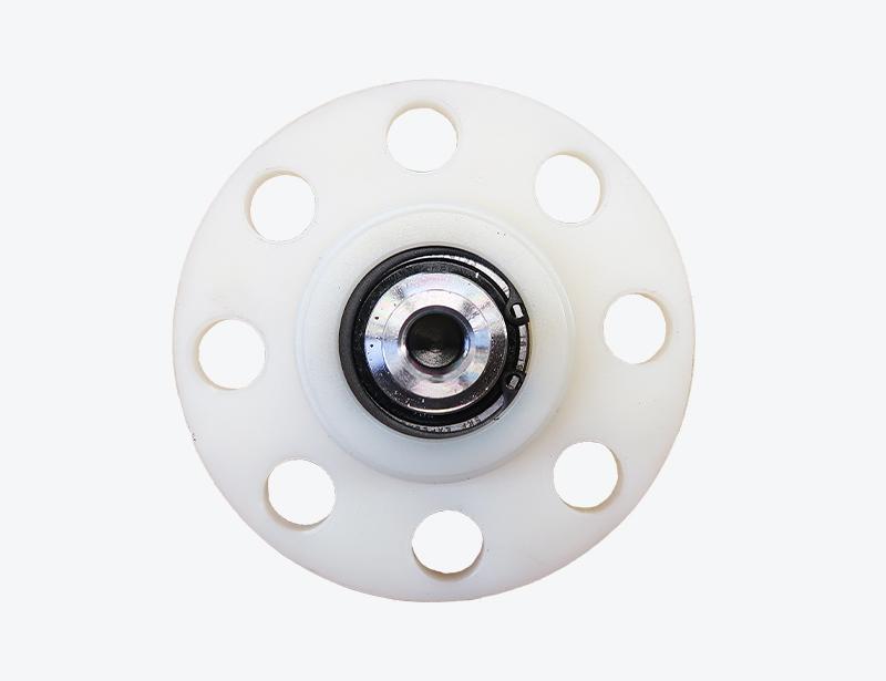 Deflection Roller including Housing and Bolt